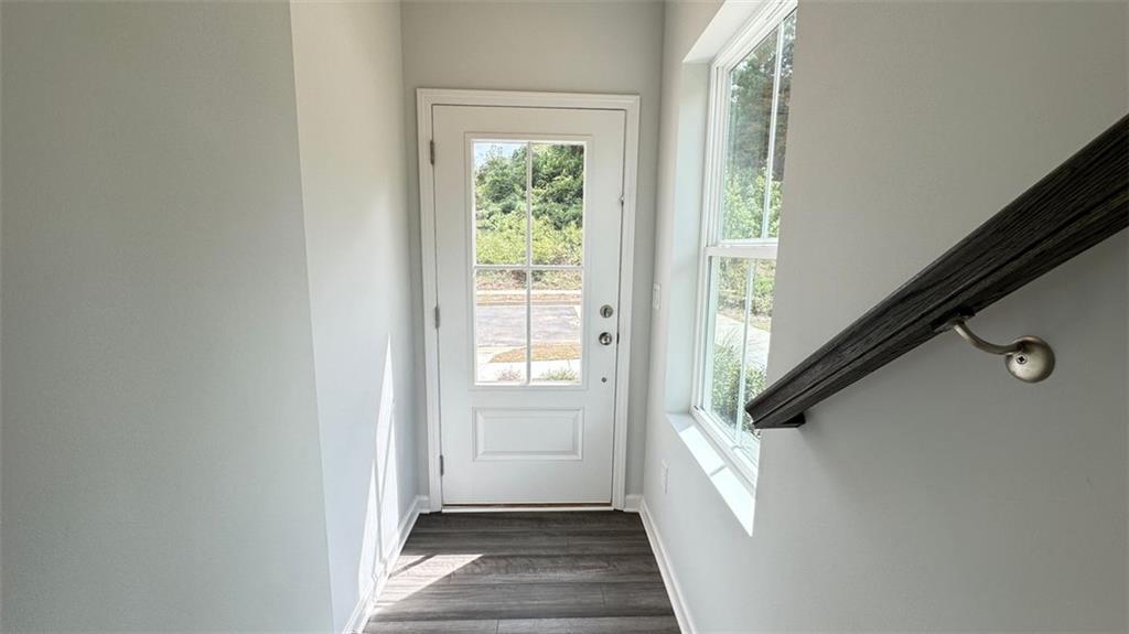 1479 Creekside Circle Northwest Atlanta, GA 30318 - Photo 5 of 42 a view of a hallway with windows