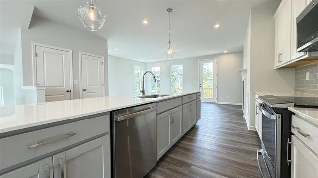 a large kitchen with cabinets