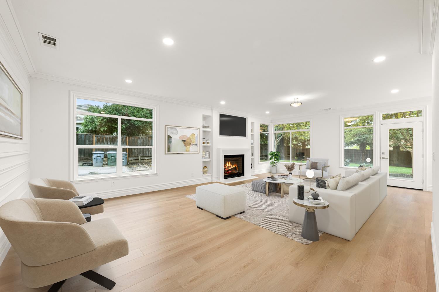 9337 Crocker Road Granite Bay, CA 95746 - Photo 11 of 56 a living room with furniture and a fireplace