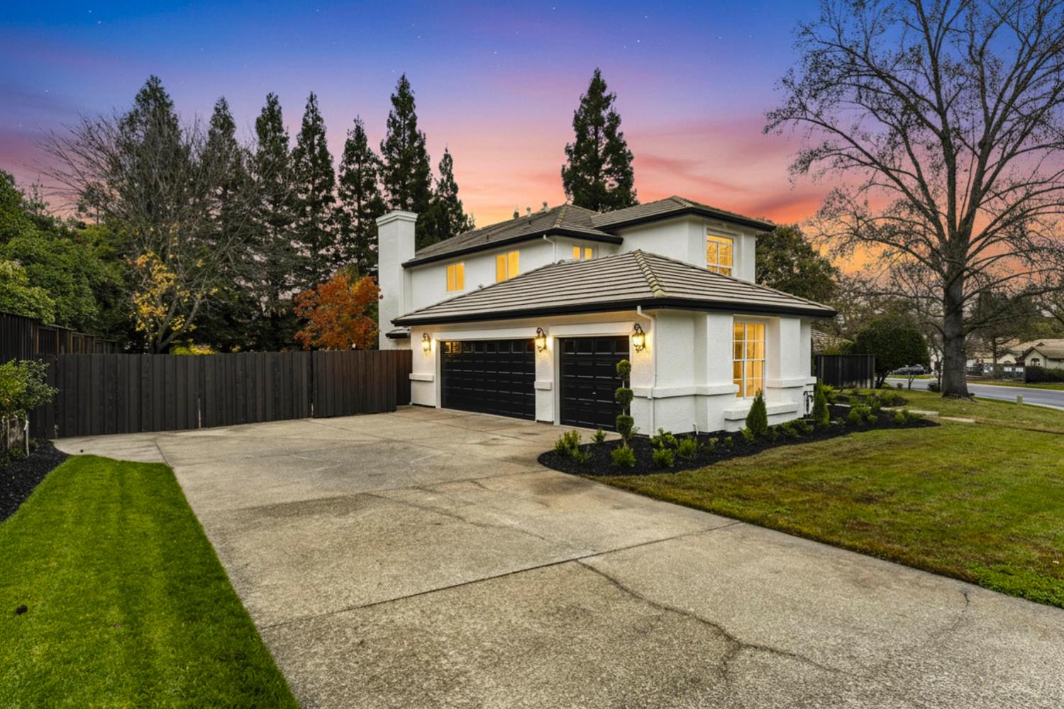 9337 Crocker Road Granite Bay, CA 95746 - Photo 3 of 56 a front view of a house with a yard and trees