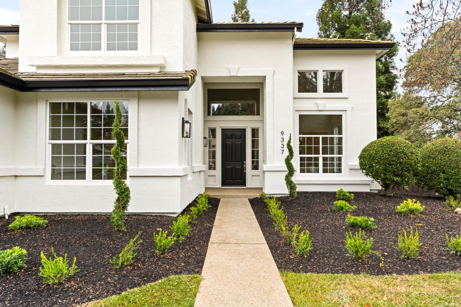 9337 Crocker Road Granite Bay, CA 95746 - Photo 6 of 56 a front view of a house with a yard