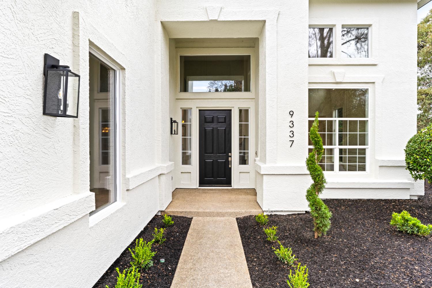 9337 Crocker Road Granite Bay, CA 95746 - Photo 7 of 56 a front view of a house with a yard