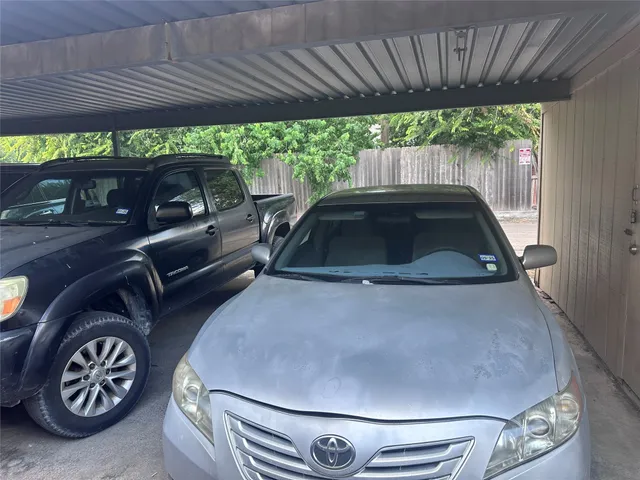 a car parked in front of a building