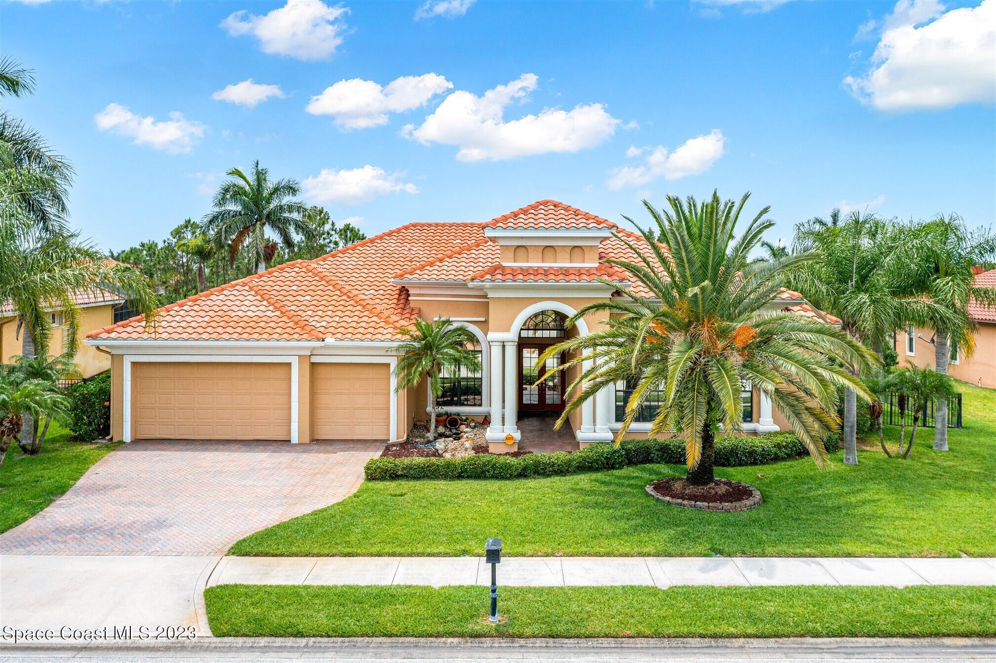 3550 Thurloe Drive Rockledge, FL 32955 - Photo 39 of 44 a front view of a house with a yard