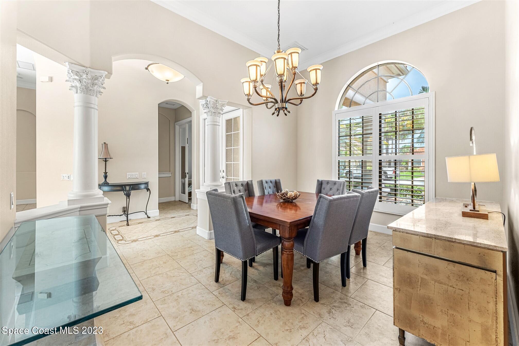 3550 Thurloe Drive Rockledge, FL 32955 - Photo 5 of 44 a view of a dining room with furniture window and outside view