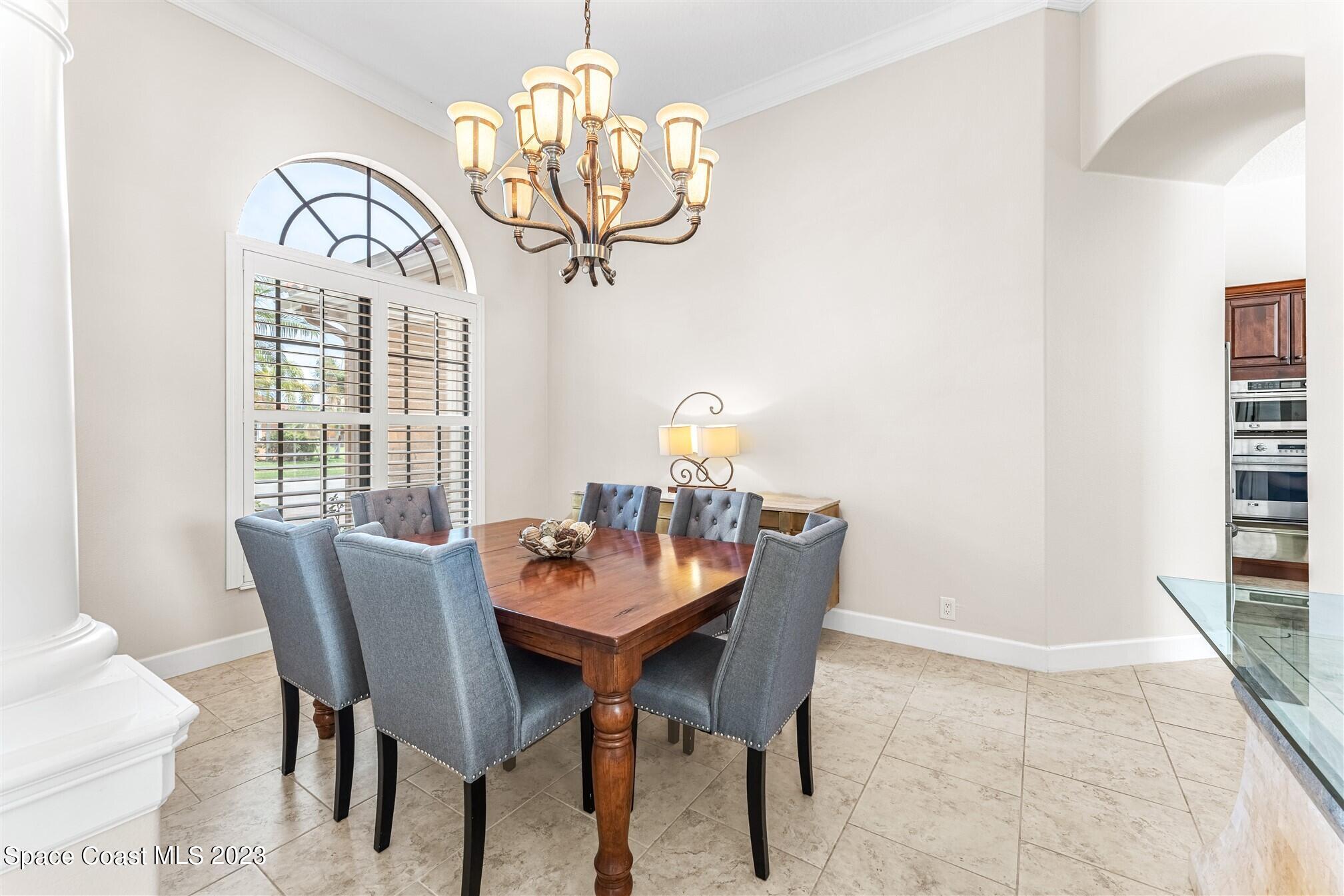 3550 Thurloe Drive Rockledge, FL 32955 - Photo 6 of 44 a view of a dining room with furniture window and outside view
