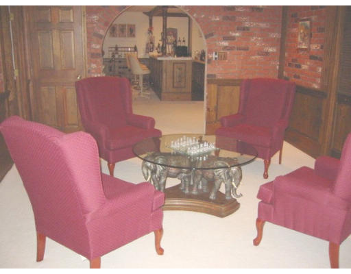 38 Adams Road Boxford, MA 01921 - Photo 21 of 23 a view of a dining room with furniture a chandelier and wooden floor