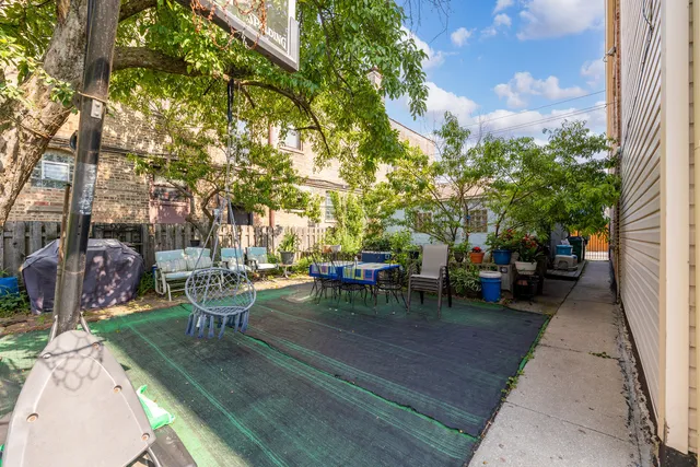 an aerial view of a city with streets and houses