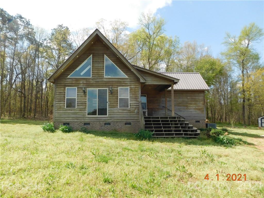 5612 Stack Road Monroe, NC 28112 - Photo 1 of 14 a front view of a house with a yard