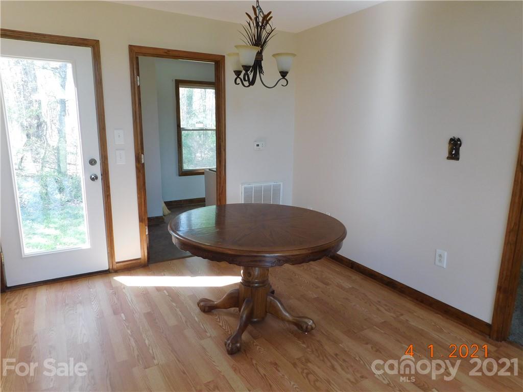 5612 Stack Road Monroe, NC 28112 - Photo 11 of 14 a view of a livingroom with furniture window and wooden floor