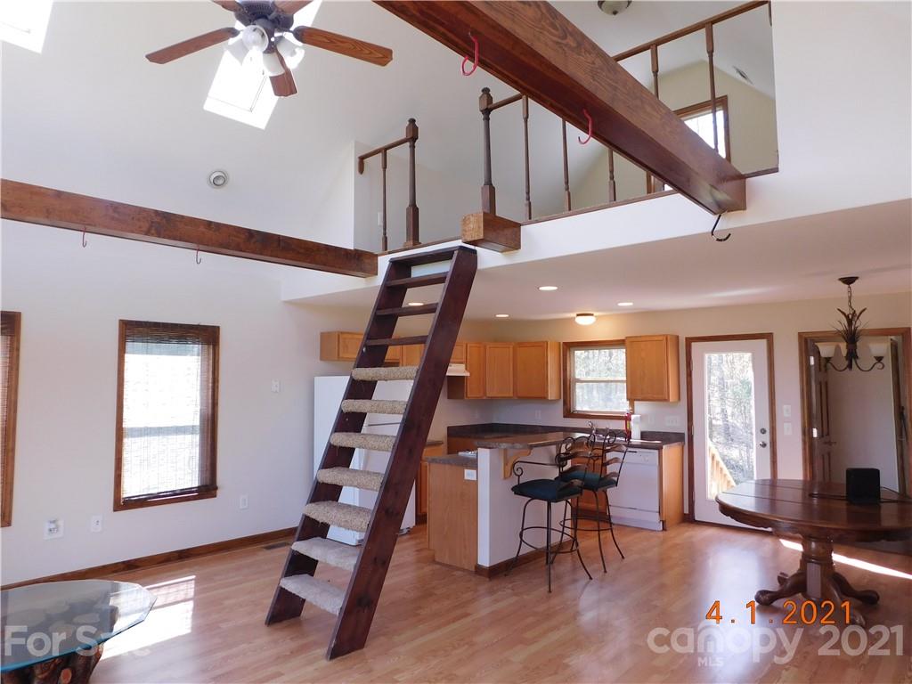 5612 Stack Road Monroe, NC 28112 - Photo 4 of 14 a view of entryway and hall with wooden floor