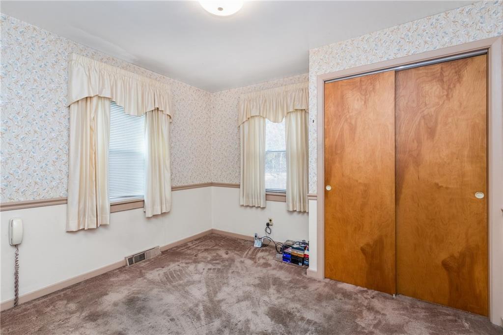 2265 Brodhead Road Aliquippa, PA 15001 - Photo 13 of 25 Bedroom 3 is on the main level so if you do not like the stairs, we got you covered. Also was used as a "TV room" in the past.
