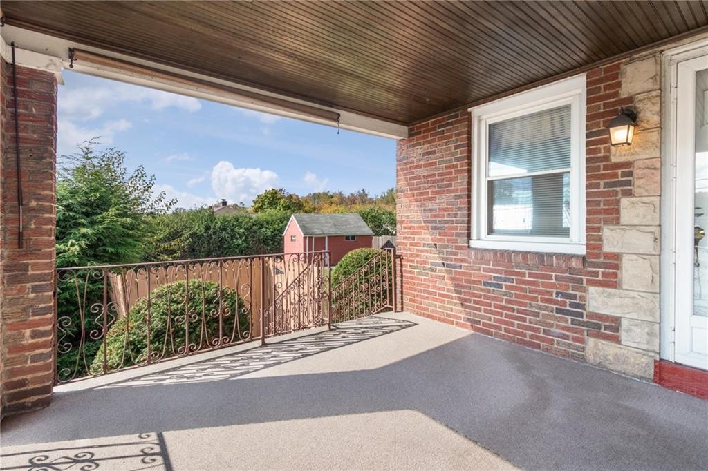 2265 Brodhead Road Aliquippa, PA 15001 - Photo 7 of 25 Upon entry off the side, you are greeted by a covered porch perfect for the morning coffee or evening wine!