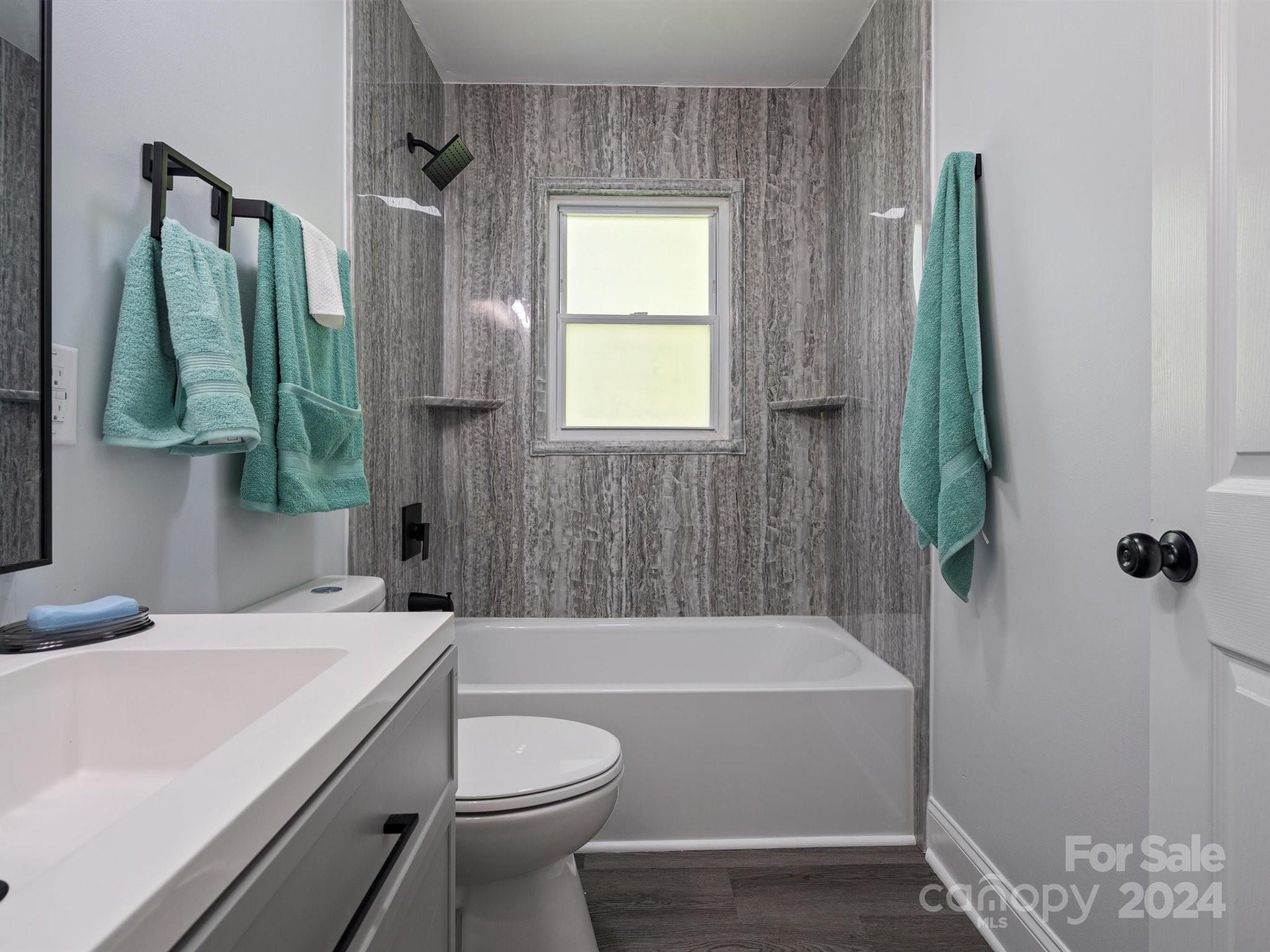 640 Summerow Road Stanley, NC 28164 - Photo 36 of 38 a bathroom with a sink toilet and shower
