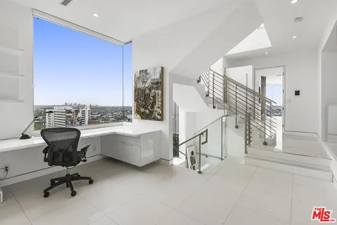 a view of entryway and livingroom