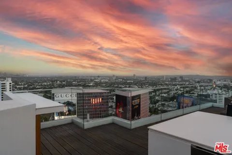 a view of a terrace with a city view
