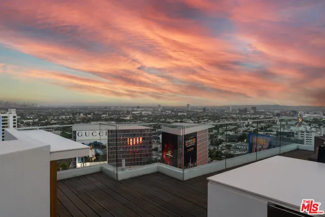 a view of a terrace with a city view
