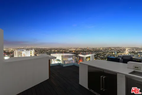 a view of a terrace with city view
