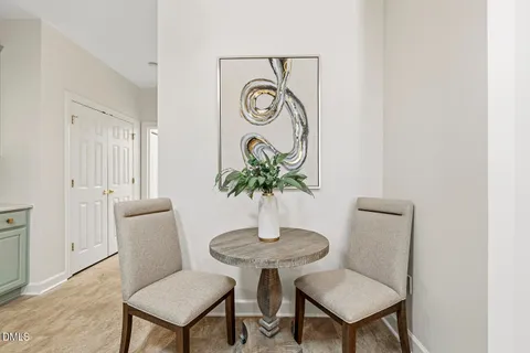 a bedroom with a bed and a chandelier fan