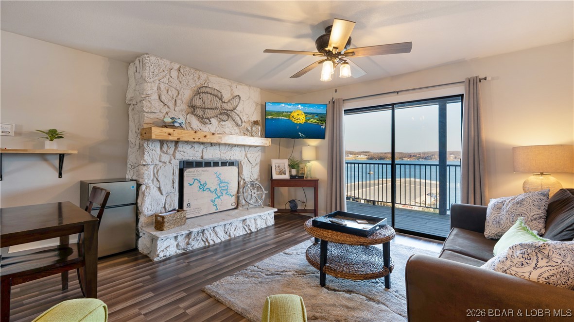 5499 3 Seasons Road, Unit C10 Osage Beach, MO 65065 - Photo 3 of 25 Cozy living area, with access to the large deck an