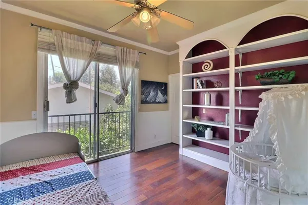 a view of a livingroom with furniture and staircase