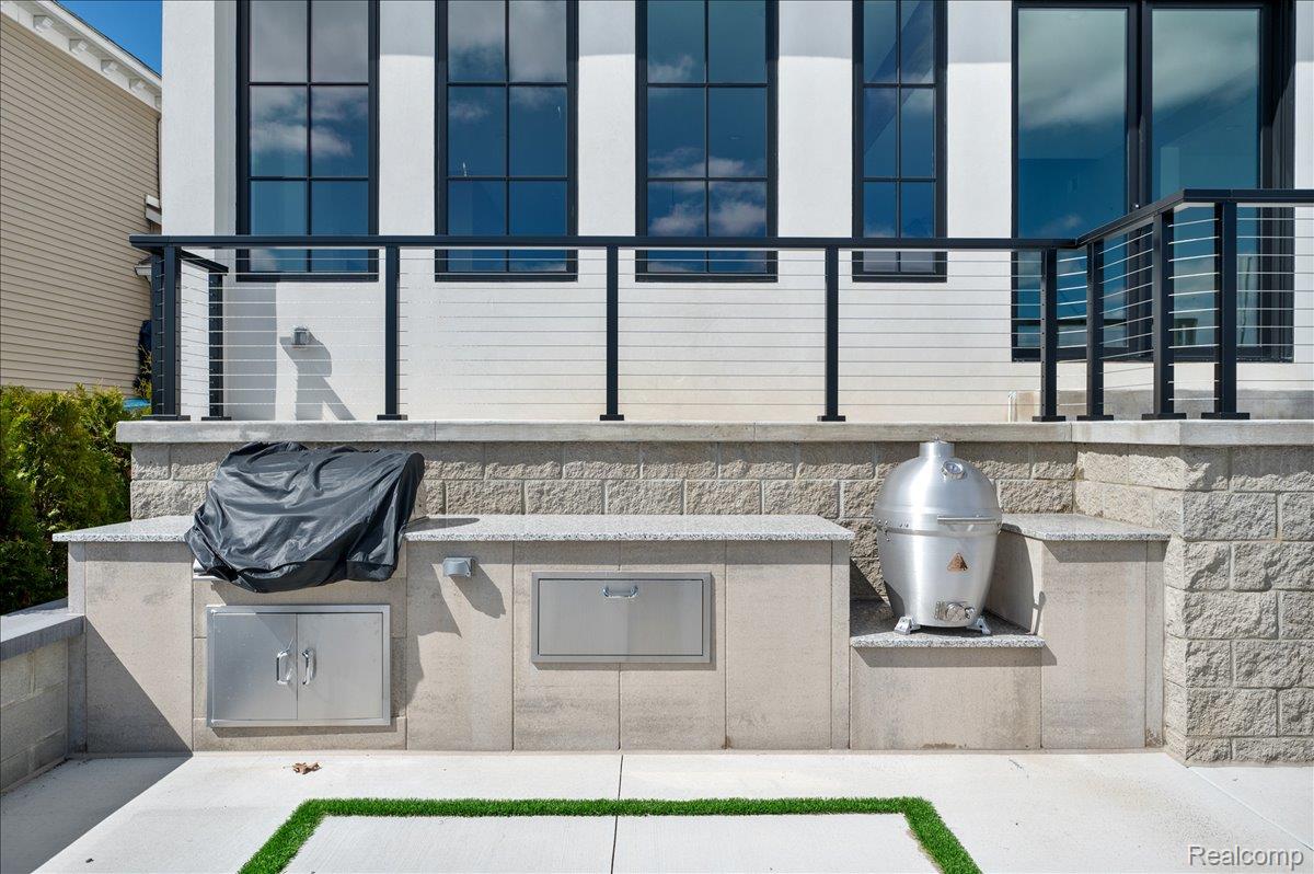 13459 Haddon Street Fenton, MI 48430 - Photo 62 of 84 View of patio / terrace featuring an outdoor kitchen