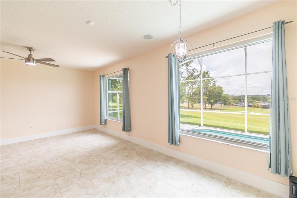 3862 Beacon Ridge Way Clermont, FL 34711 - Photo 25 of 56 a view of an empty room with a window