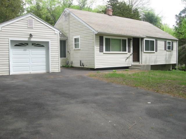 312 Moose Hill Road Monroe, CT 06468 - Photo 1 of 1 a view of a house with a yard and garage