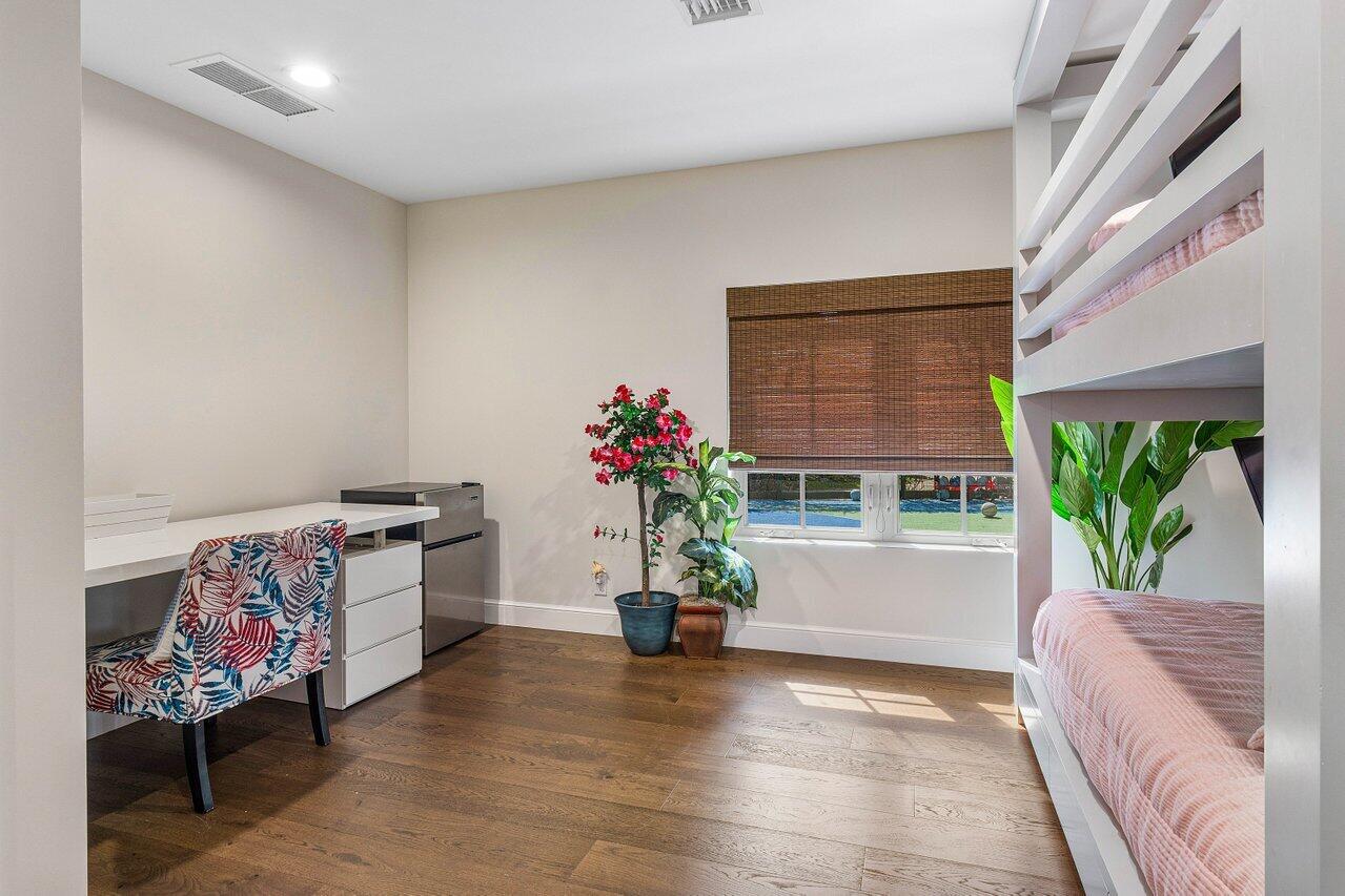 963 Eve Street Delray Beach, FL 33483 - Photo 30 of 83 a living room with furniture and a potted plant