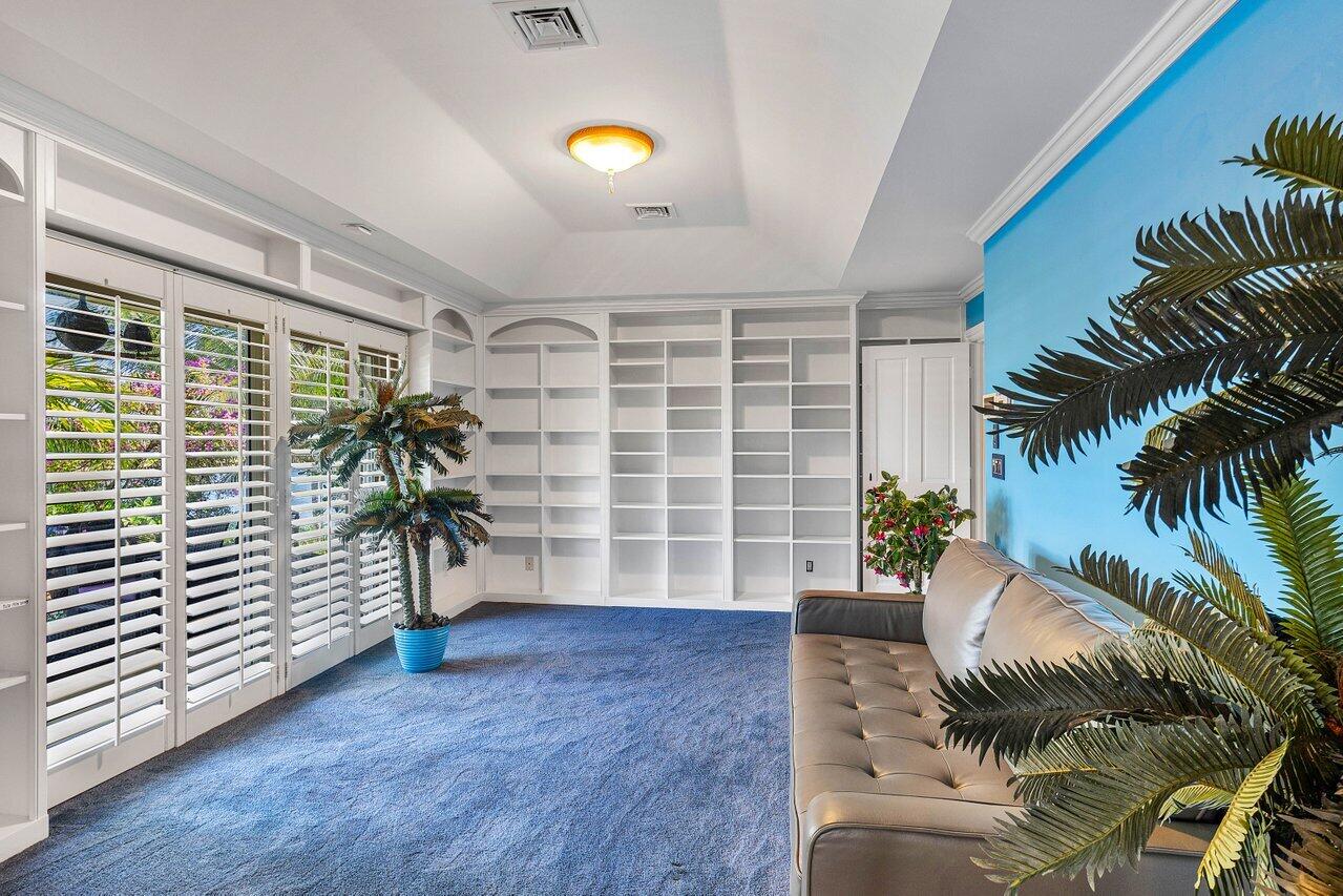 963 Eve Street Delray Beach, FL 33483 - Photo 35 of 83 a view of a livingroom with furniture and a potted plant