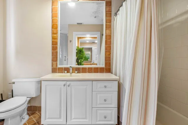 a view of a park with sitting area