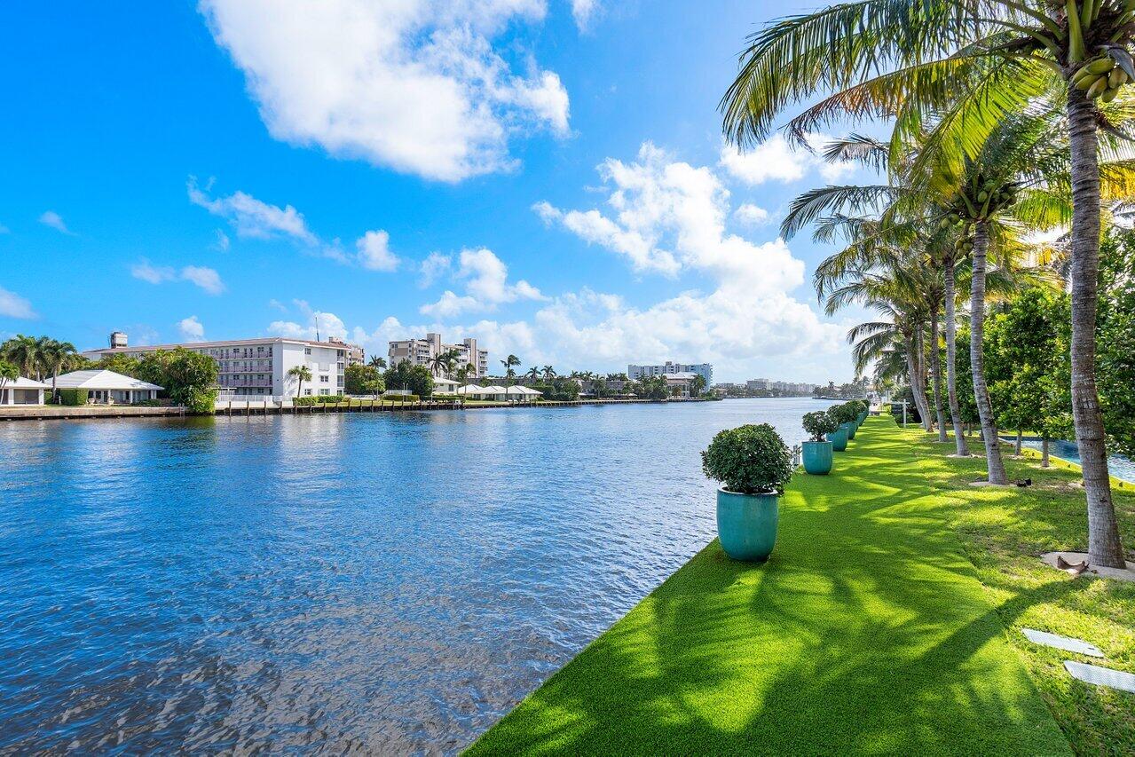 963 Eve Street Delray Beach, FL 33483 - Photo 59 of 83 a view of a lake from a yard