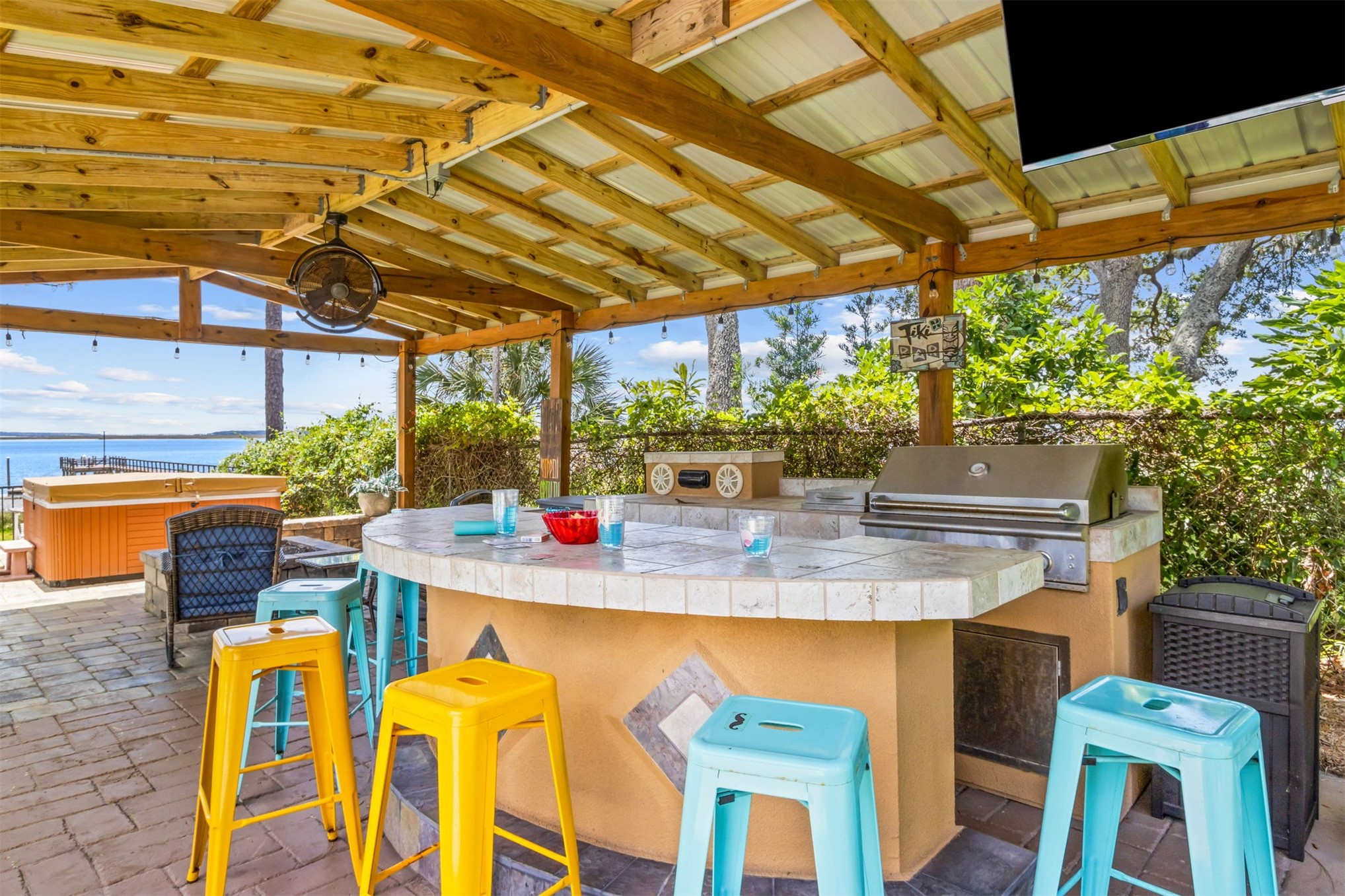 95210 Cook Road Fernandina Beach, FL 32034 - Photo 34 of 70 a table and chairs in front of a building