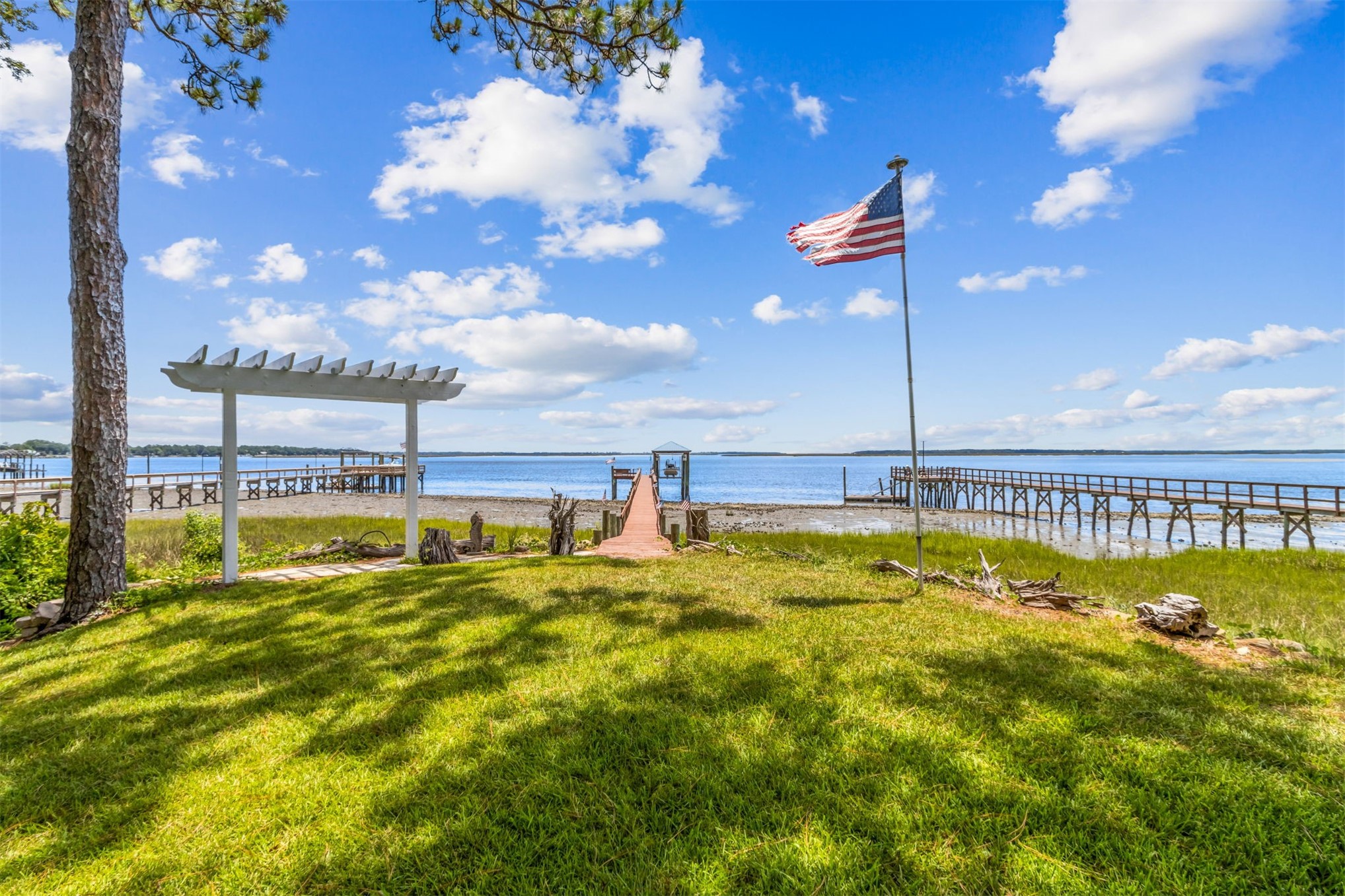 95210 Cook Road Fernandina Beach, FL 32034 - Photo 45 of 70 a swimming pool with outdoor seating
