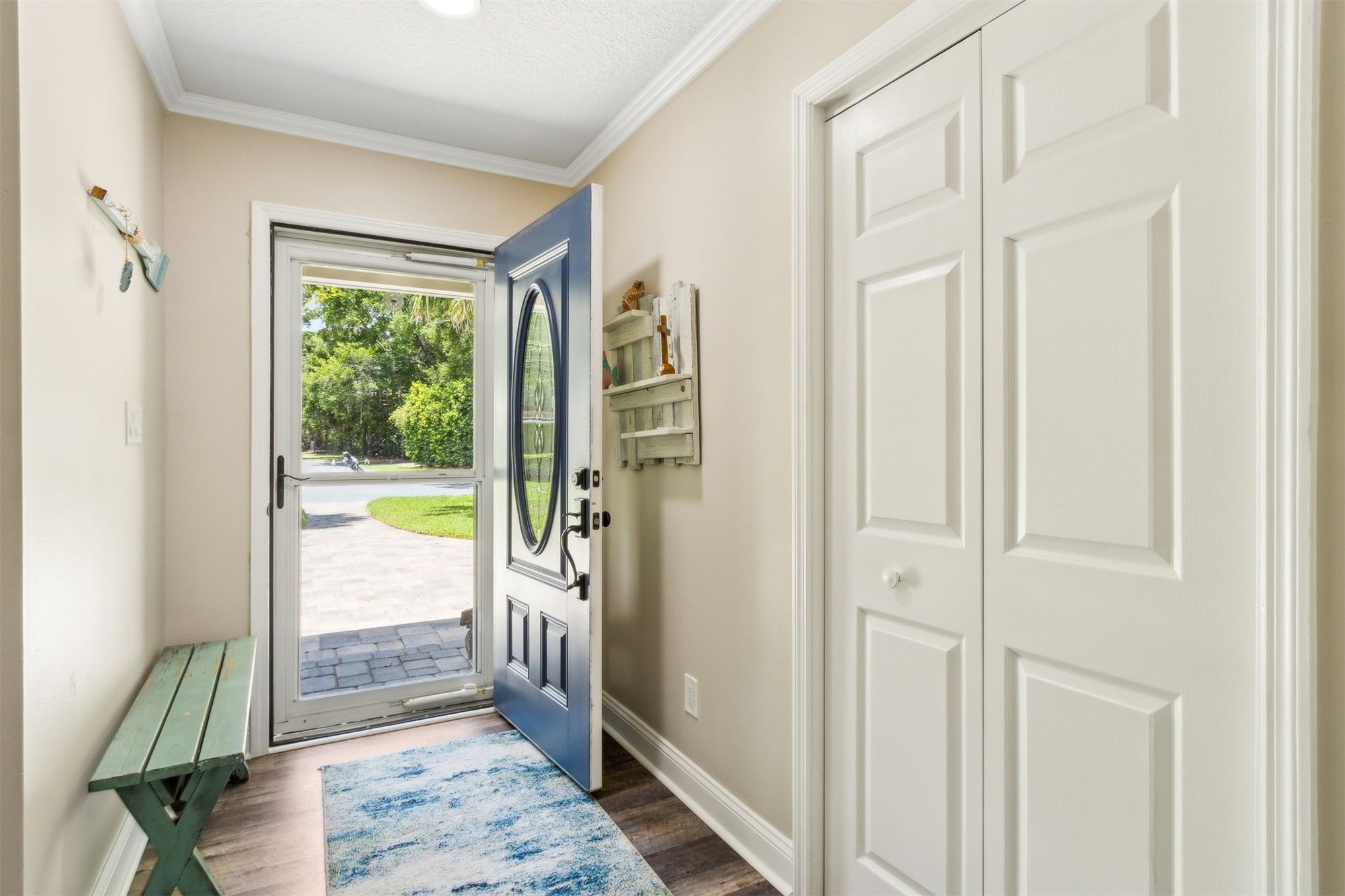 95210 Cook Road Fernandina Beach, FL 32034 - Photo 50 of 70 a view of a hallway with a floor to ceiling window and a kitchen