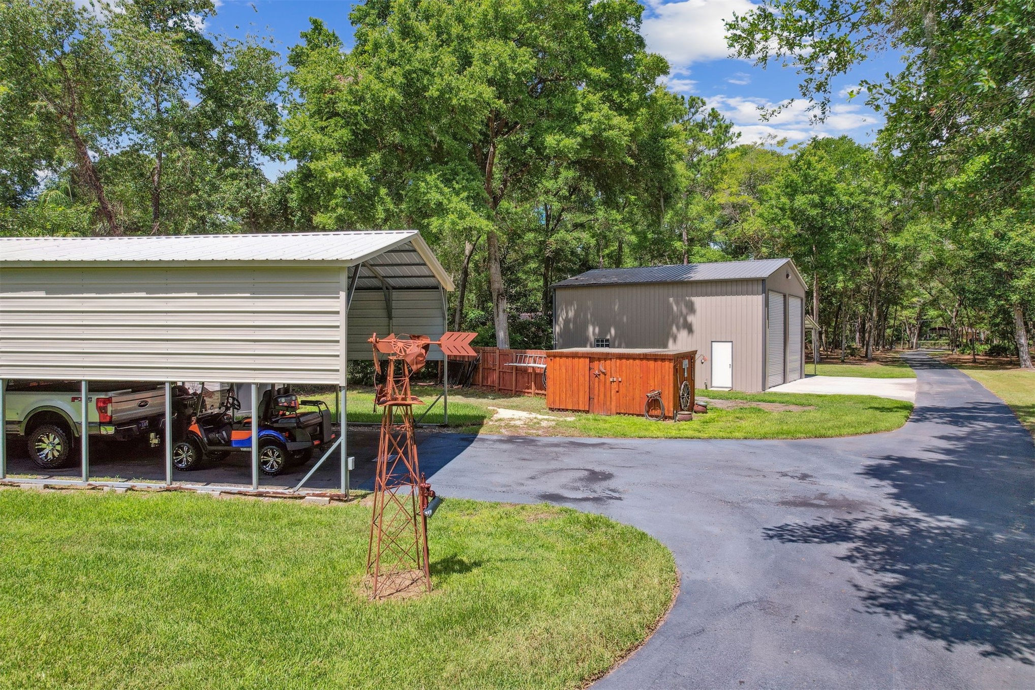 95210 Cook Road Fernandina Beach, FL 32034 - Photo 53 of 70 a view of a house with pool and a yard