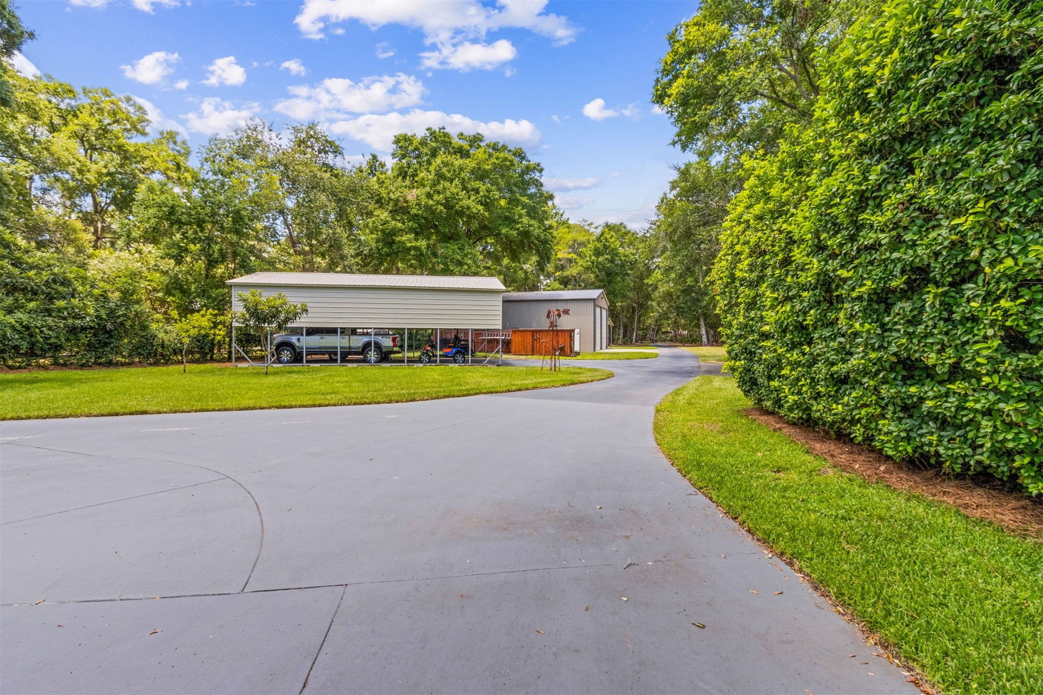 95210 Cook Road Fernandina Beach, FL 32034 - Photo 60 of 70 a view of a swimming pool with an outdoor space and seating area