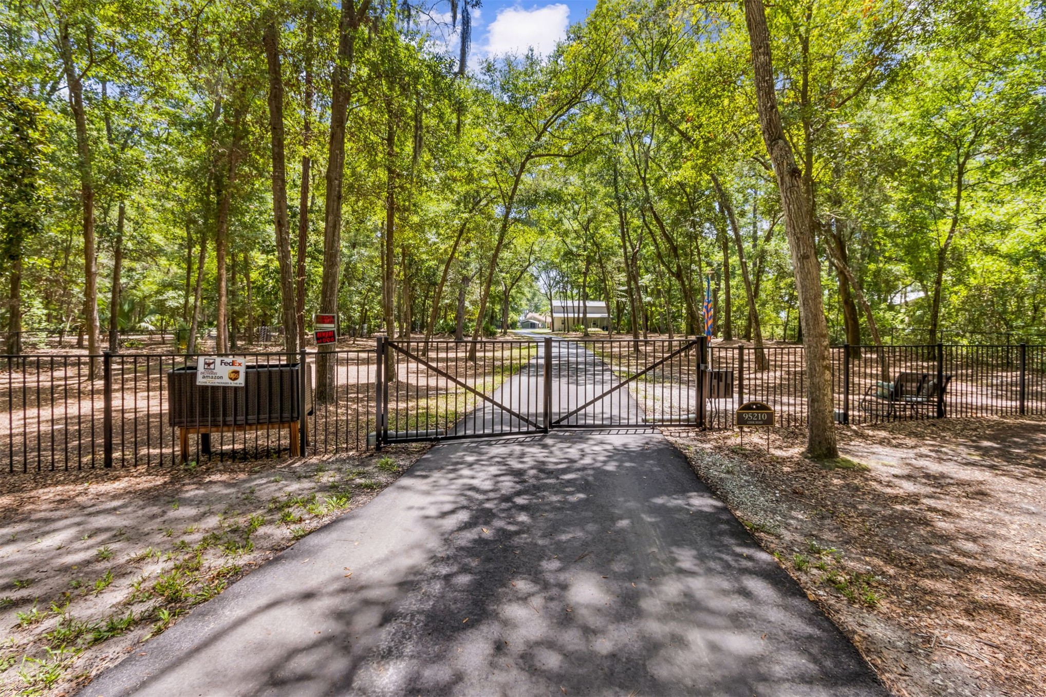 95210 Cook Road Fernandina Beach, FL 32034 - Photo 68 of 70 a view of outdoor space with deck and trees