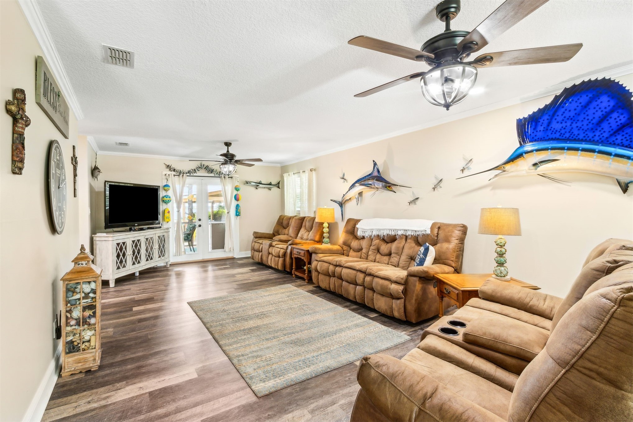 95210 Cook Road Fernandina Beach, FL 32034 - Photo 8 of 70 a living room with furniture and a flat screen tv
