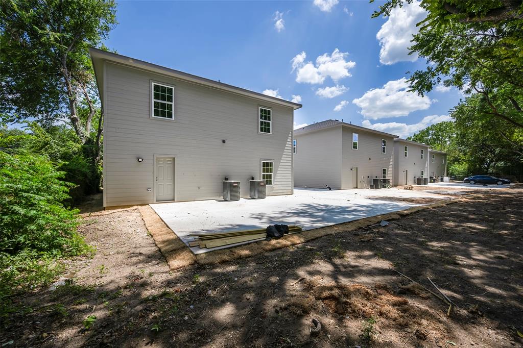 3523 Herrling Street Dallas, TX 75210 - Photo 2 of 14 Back of house featuring a patio