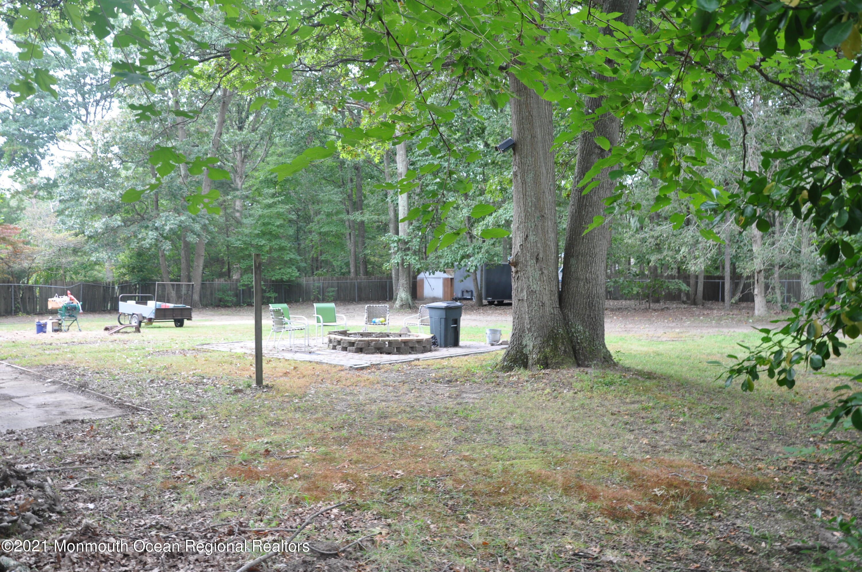 542 South Cooks Bridge Road Jackson, NJ 08527 - Photo 44 of 50 a view of a tree in the middle of a yard