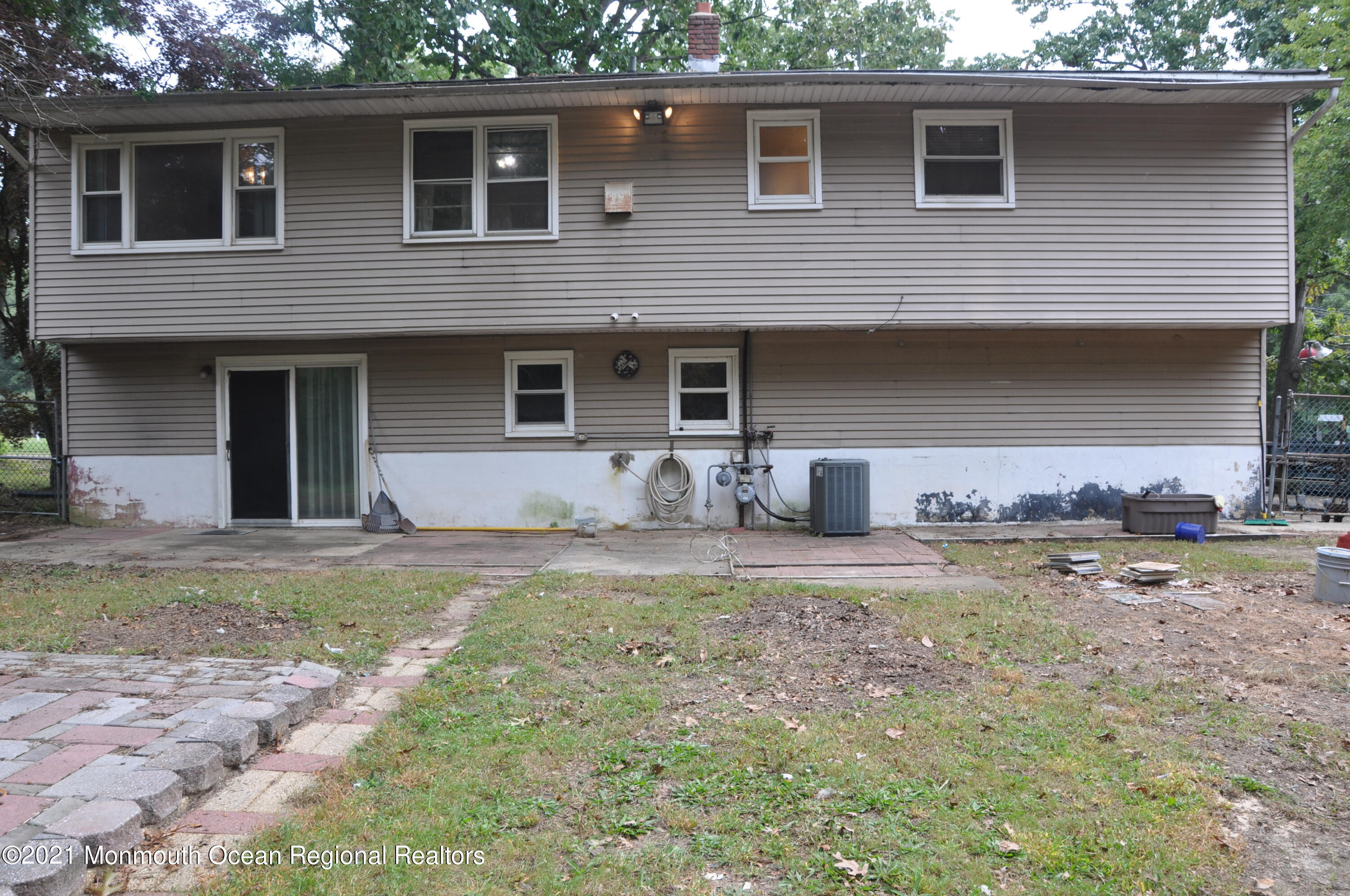 542 South Cooks Bridge Road Jackson, NJ 08527 - Photo 50 of 50 a front view of a house with a garden and yard