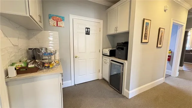 a kitchen with stainless steel appliances a refrigerator and a stove