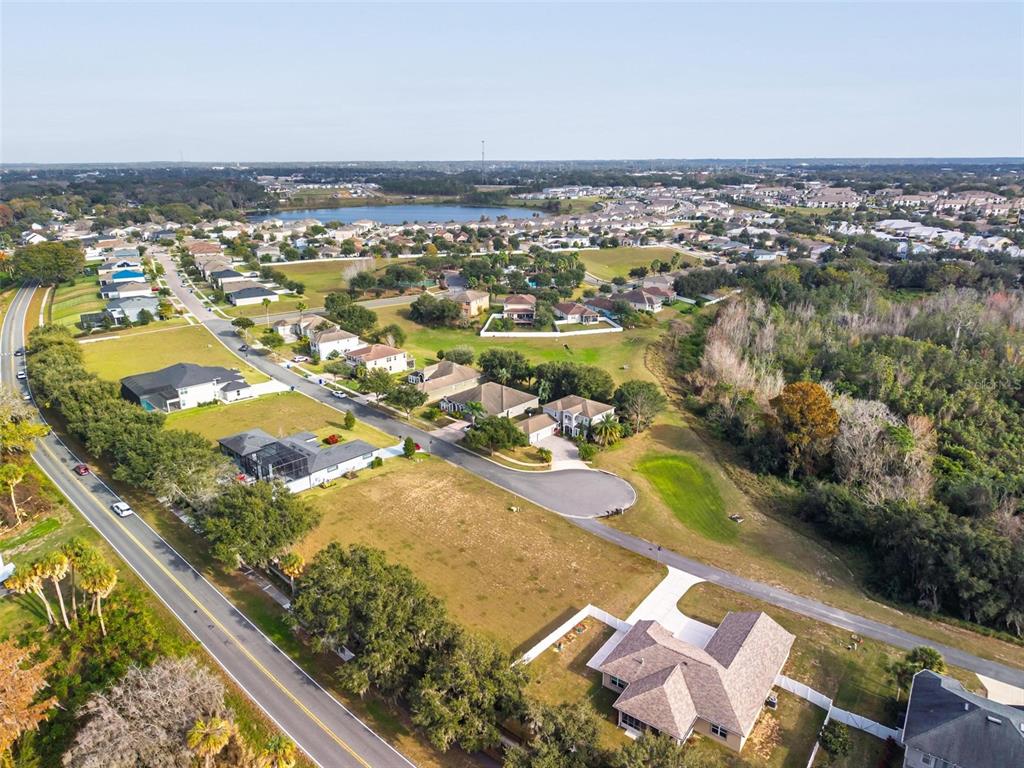 3225 Landing View Tavares, FL 32778 - Photo 15 of 31 an aerial view of residential houses with outdoor space