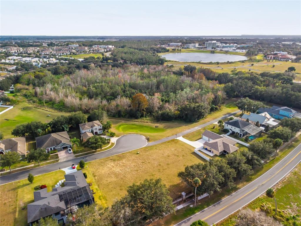 3225 Landing View Tavares, FL 32778 - Photo 19 of 31 an aerial view of residential houses with outdoor space and swimming pool