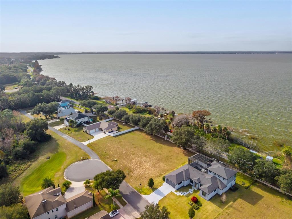 3225 Landing View Tavares, FL 32778 - Photo 24 of 31 an aerial view of residential houses with outdoor space