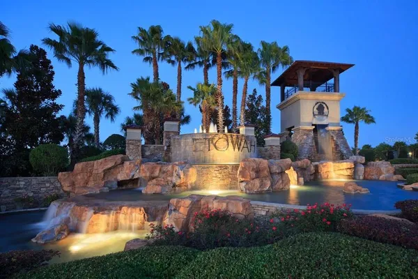 a front view of a house with swimming pool