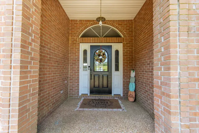 a front view of a house with door