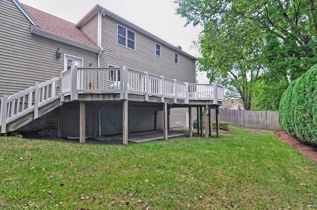 4 Nottingham Way Stoneham, MA 02180 - Photo 30 of 30 a view of a house with a yard and sitting area
