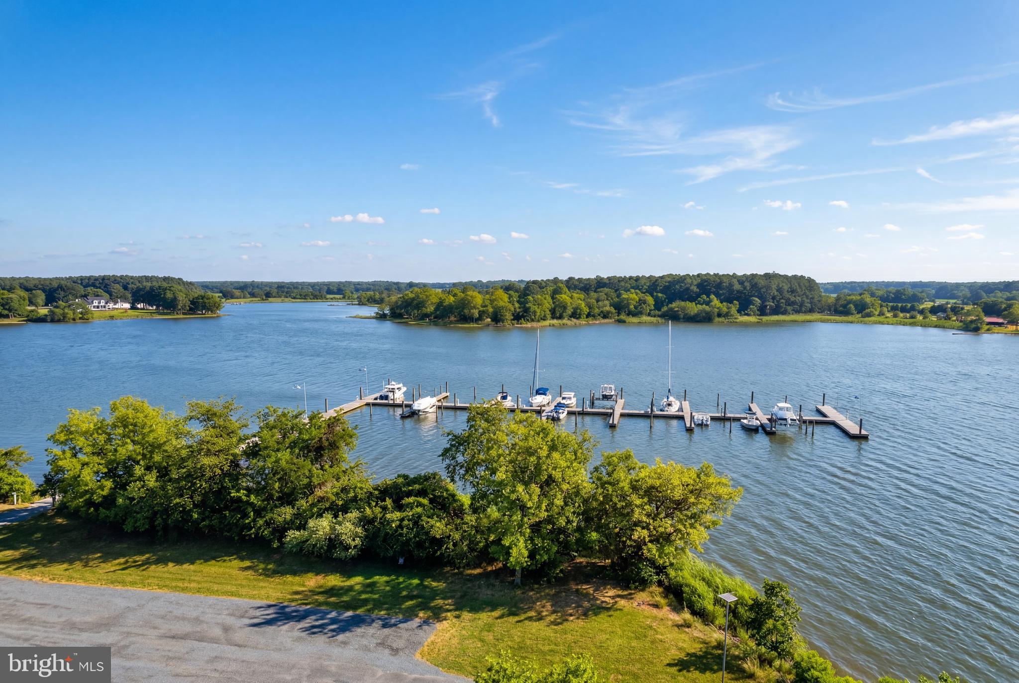 Lot 30 Hagy Road Rock Hall, MD 21661 - Photo 16 of 16 a view of a lake with houses in the back